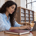 A student writing an email to university admissions